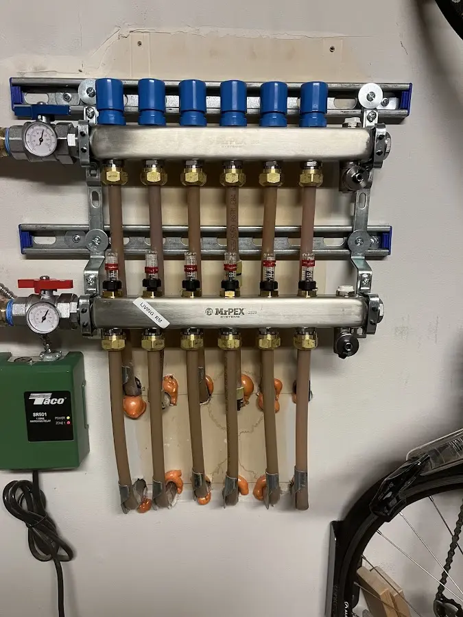 Plumber performing Gas Line Installation at a residential property in Stokesdale